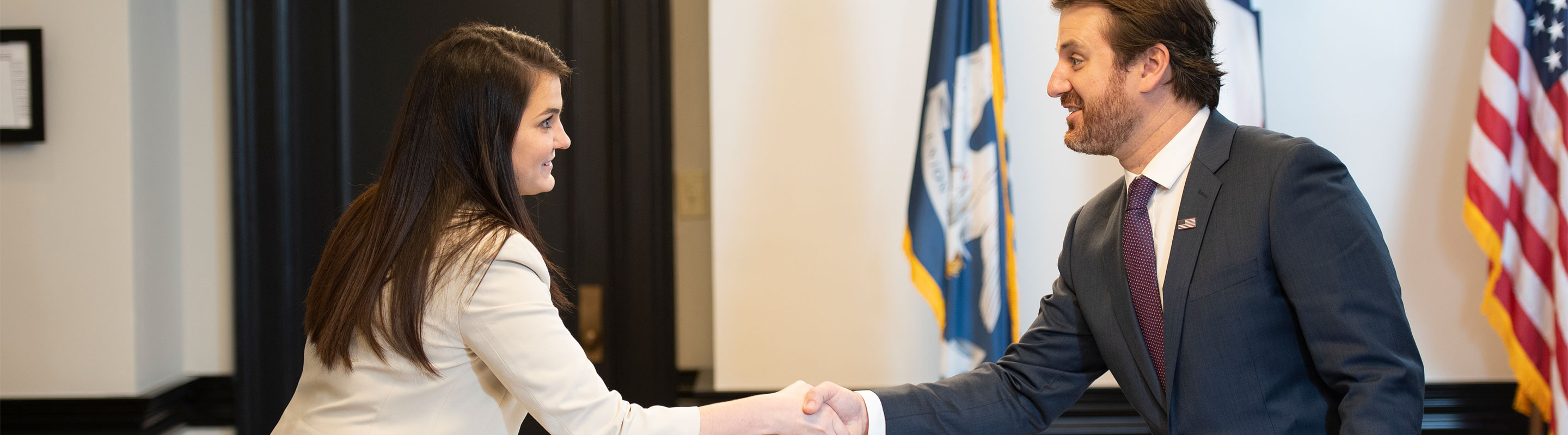 Two Students Shaking Hands